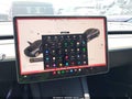 2024 Tesla Model Y — photo 18 of 20 | VIN 7SAYGAEE1RF091533