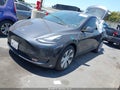 2024 Tesla Model Y — photo 2 of 20 | VIN 7SAYGAEE1RF091533