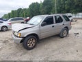 2004 Isuzu Rodeo — photo 2 of 18 | VIN 4S2CK58W244315012