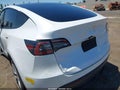 2021 Tesla Model Y — photo 22 of 23 | VIN 5YJYGDEE0MF284876