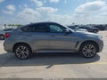 2016 BMW X6 — photo 13 of 16 | VIN 5UXKU0C5XG0F92359