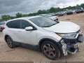 2017 Honda CR-V — photo 13 of 16 | VIN 2HKRW1H57HH517953