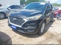 2019 Hyundai Tucson — photo 2 of 16 | VIN KM8J23A40KU890220