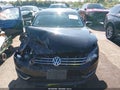 2015 Volkswagen Passat — photo 12 of 16 | VIN 1VWBV7A31FC062667