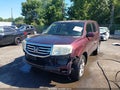 2013 Honda Pilot — photo 6 of 16 | VIN 5FNYF4H46DB022947