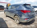 2017 Hyundai Santa Fe — photo 3 of 16 | VIN 5NMZTDLB3HH003845