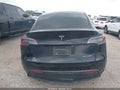 2023 Tesla Model Y — photo 16 of 18 | VIN 7SAYGDEE5PF909358