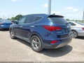 2017 Hyundai Santa Fe — photo 3 of 16 | VIN 5XYZU3LB6HG461056