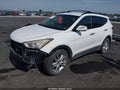 2013 Hyundai Santa Fe — photo 2 of 17 | VIN 5XYZU3LA6DG107488
