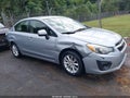 2014 Subaru Impreza — photo 13 of 17 | VIN JF1GJAC64EH013849