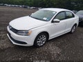 2014 Volkswagen Jetta — photo 2 of 11 | VIN 3VWD17AJ3EM238828
