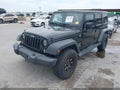 2015 Jeep Wrangler Unlimited — photo 2 of 17 | VIN 1C4BJWDG7FL510191