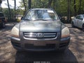 2005 Kia Sportage — photo 12 of 16 | VIN KNDJF723357082310