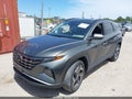 2022 Hyundai Tucson — photo 2 of 15 | VIN 5NMJCCAE0NH157557