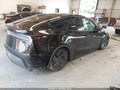 2026 Tesla Model Y — photo 4 of 16 | VIN 7SAYGDEE6TA415341