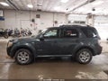 2008 Mercury Mariner — photo 14 of 16 | VIN 4M2CU97148KJ32354