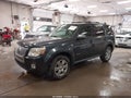 2008 Mercury Mariner — photo 2 of 16 | VIN 4M2CU97148KJ32354