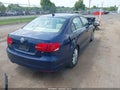 2014 Volkswagen Jetta — photo 4 of 16 | VIN 3VWD17AJ8EM377112