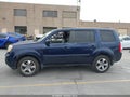 2013 Honda Pilot — photo 6 of 16 | VIN 5FNYF3H47DB043137