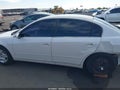 2003 Nissan Altima — photo 14 of 17 | VIN 1N4AL11D23C125285