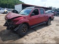 2004 Nissan Frontier — photo 2 of 17 | VIN 1N6ED29Y54C417811