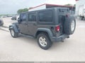2017 Jeep Wrangler Unlimited — photo 3 of 16 | VIN 1C4BJWDG7HL598534
