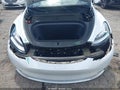 2022 Tesla Model Y — photo 10 of 18 | VIN 7SAYGDEE1NF368452