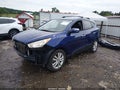 2011 Hyundai Tucson — photo 2 of 12 | VIN KM8JU3ACXBU220272