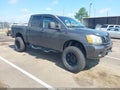 2004 Nissan Titan — photo 1 of 11 | VIN 1N6AA07B84N582203