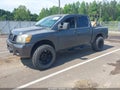 2004 Nissan Titan — photo 2 of 11 | VIN 1N6AA07B84N582203