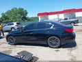2016 Infiniti Q50 — photo 14 of 19 | VIN JN1CV7ARXGM250212