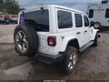 2022 Jeep Wrangler Unlimited — photo 4 of 19 | VIN 1C4HJXEG7NW245705