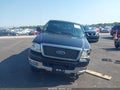 2004 Ford F-150 — photo 12 of 16 | VIN 1FTPX14554FA27672