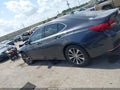 2015 Acura TLX — photo 14 of 16 | VIN 19UUB1F34FA013518