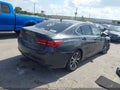 2015 Acura TLX — photo 4 of 16 | VIN 19UUB1F34FA013518