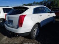 2013 Cadillac SRX — photo 4 of 10 | VIN 3GYFNGE3XDS528421