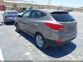 2013 Hyundai Tucson — photo 3 of 17 | VIN KM8JU3AC1DU616934