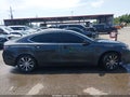 2016 Acura TLX — photo 13 of 17 | VIN 19UUB1F54GA009519