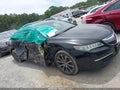 2015 Acura TLX — photo 13 of 16 | VIN 19UUB3F50FA004697