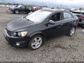 2013 Chevrolet Sonic — photo 2 of 16 | VIN 1G1JE5SB2D4157070