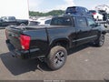 2016 Toyota Tacoma — photo 4 of 16 | VIN 3TMDZ5BN7GM010111