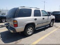 2004 Chevrolet Tahoe — photo 4 of 17 | VIN 1GNEC13VX4J319648