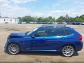 2014 BMW X1 — photo 14 of 16 | VIN WBAVM5C57EVV93068