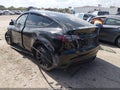 2024 Tesla Model Y — photo 3 of 14 | VIN 7SAYGAEE7RF092041