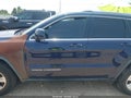 2014 Jeep Grand Cherokee — photo 14 of 17 | VIN 1C4RJEAG1EC270809
