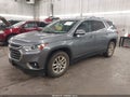 2018 Chevrolet Traverse — photo 2 of 16 | VIN 1GNEVGKW3JJ200309