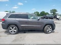 2014 Jeep Grand Cherokee — photo 13 of 19 | VIN 1C4RJFBG1EC205902