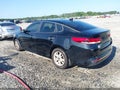 2016 Kia Optima — photo 3 of 11 | VIN 5XXGT4L39GG106894