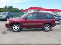 2003 GMC Envoy — photo 13 of 16 | VIN 1GKDT13S232348424