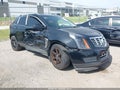 2015 Cadillac SRX — photo 1 of 17 | VIN 3GYFNEE35FS587674